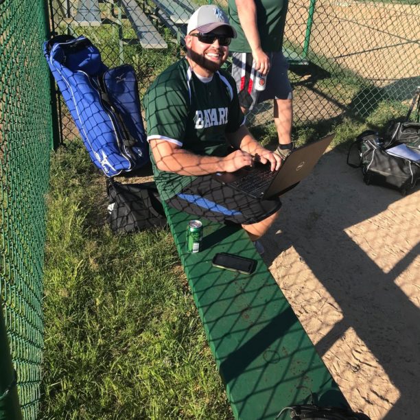 Greg Flasser working at softball game